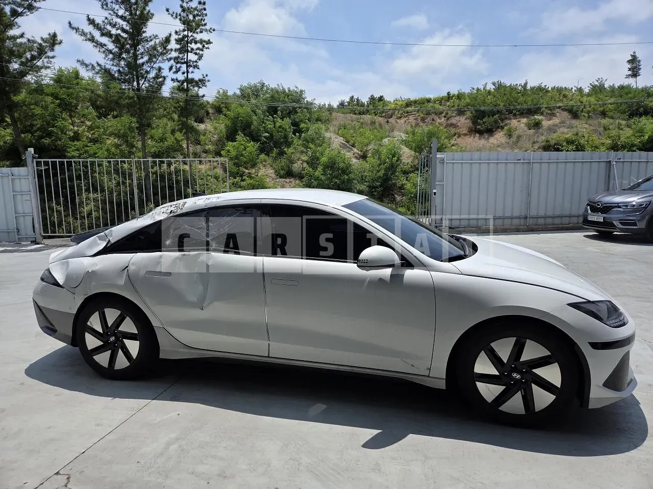 Photo 2 of 14: 2022 Hyundai IONIQ 6, VIN KMHM341AFPA010977 — Korean insurance auction