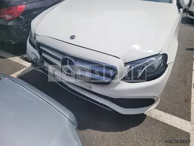 Photo 1 of 25: 2018 Mercedes-Benz E200, VIN WDDZF4CB6JA386015 — Korean insurance auction