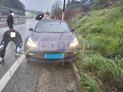 Photo 1 of 31: 2021 Tesla Model 3 Long Range, VIN 5YJ3E1EB7MF952015 — Korean insurance auction