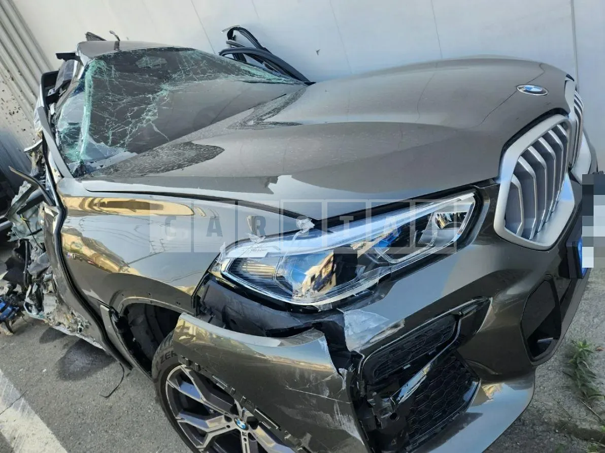 Photo 2 of 6: 2022 BMW X6 xDrive30d, VIN WBAGT8107N9M17621 — Korean insurance auction