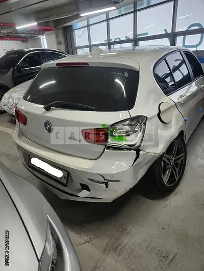 Photo 1 of 6: 2017 BMW 118d, VIN WBA1S5102H5D28657 — Korean insurance auction