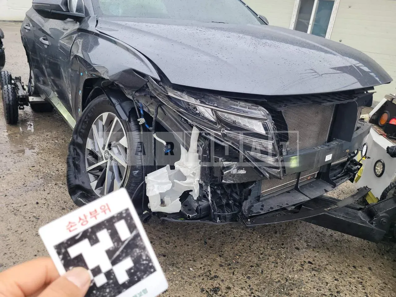 Photo 2 of 22: 2021 Hyundai Tucson, VIN KMHJC81BGNU093109 — Korean insurance auction
