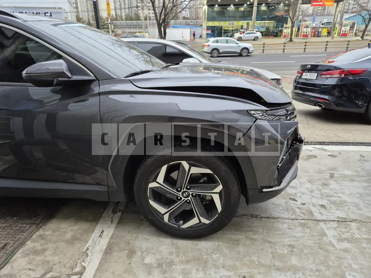 Photo 2 of 17: 2021 Hyundai Tucson, VIN KMHJC81BGMU067547 — Korean insurance auction