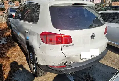 Photo 1 of 8: 2015 Volkswagen Tiguan 2.0 TDI Blue Motion, VIN WVGZZZ5NZFW611987 — Korean insurance auction