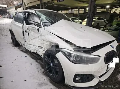 Photo 1 of 20: 2018 BMW 118d, VIN WBA1S5104J5L14200 — Korean insurance auction