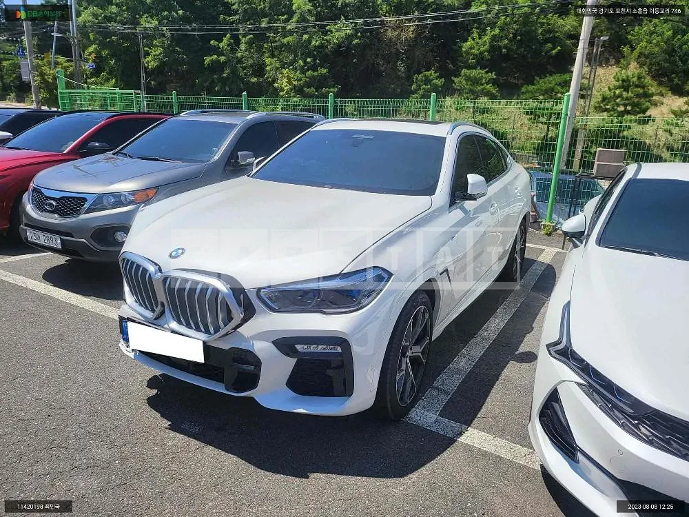 Photo 2 of 10: 2021 BMW X6 xDrive 40i, VIN WBACY6108M9F67226 — Korean insurance auction