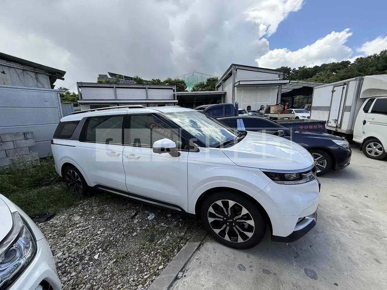 Photo 2 of 13: 2023 Kia Carnival, VIN KNANC813BPS275334 — Korean insurance auction