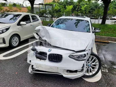 Photo 1 of 21: 2015 BMW 118d, VIN WBA1C1103FJ839544 — Korean insurance auction