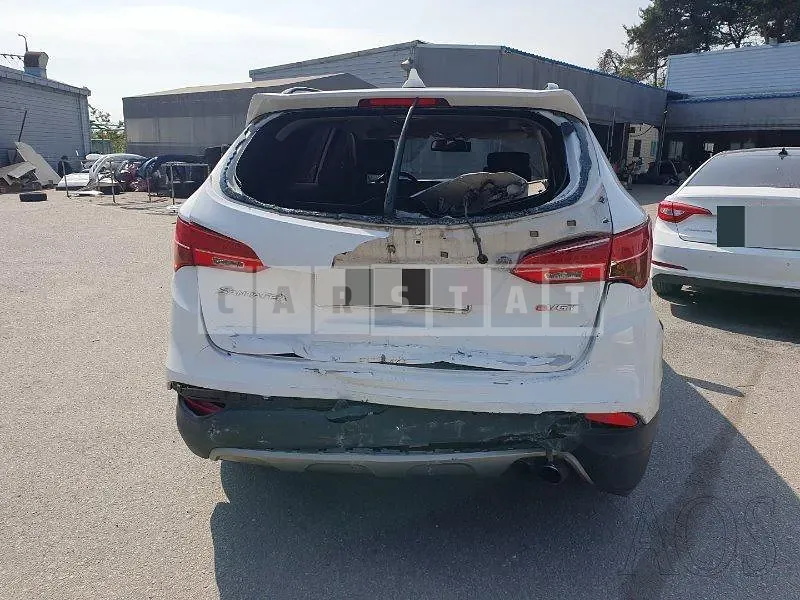 Photo 2 of 24: 2014 Hyundai Santa Fe, VIN KMHSW81XBFU311282 — Korean insurance auction