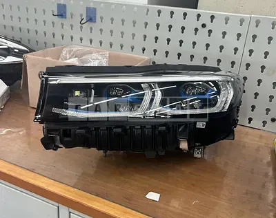 Photo 1 of 3: 2022 BMW Light 745e Headlight, VIN WBA7D6106NCK53847 — Korean insurance auction