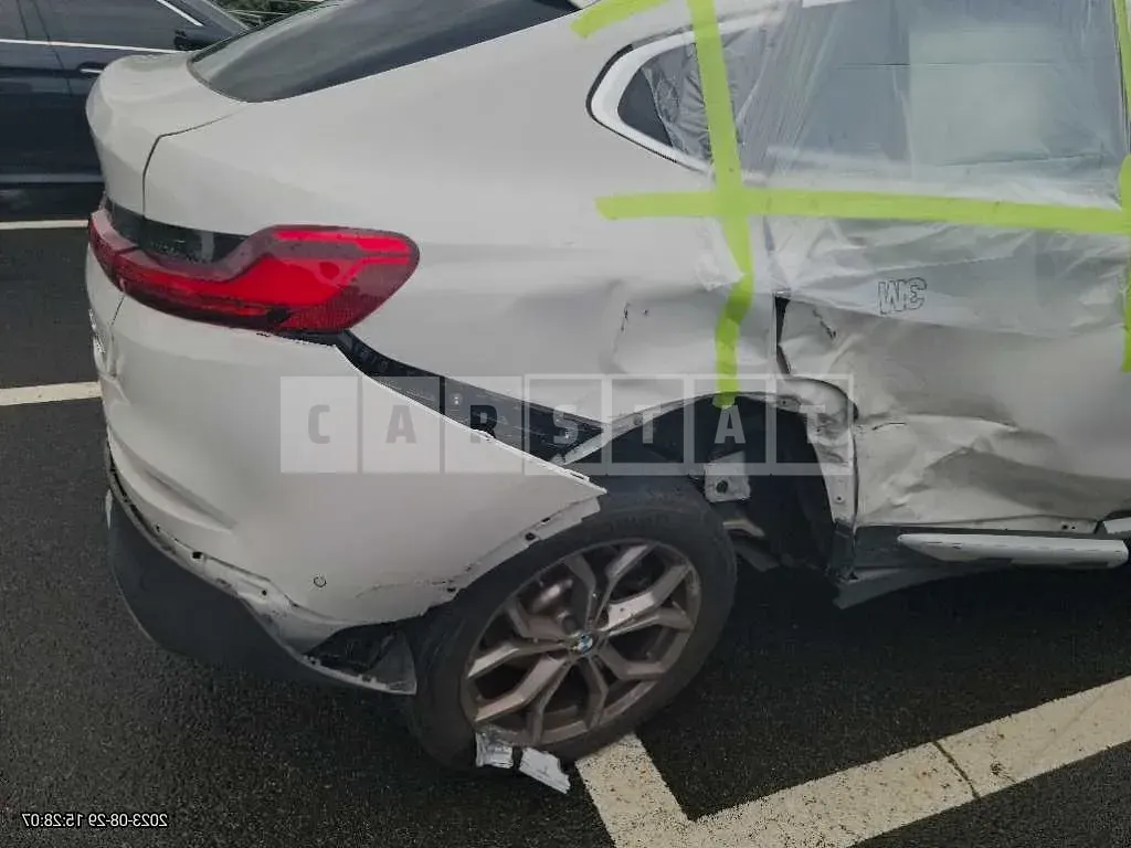 Photo 2 of 9: 2021 BMW X4 xDrive20d, VIN WBAVJ9107M9F64879 — Korean insurance auction