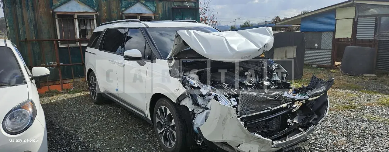 Photo 2 of 12: 2023 Kia Carnival, VIN KNANC813BPS285852 — Korean insurance auction