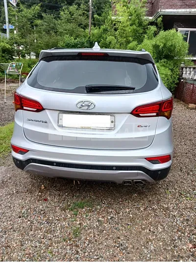 Photo 1 of 6: 2016 Hyundai Santa Fe, VIN KMHSW81XBGU660529 — Korean insurance auction