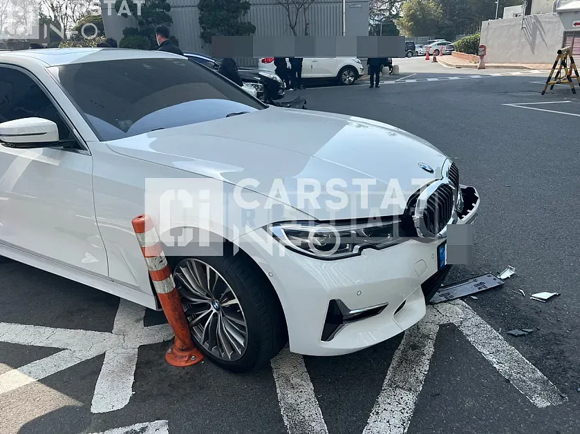 Photo 2 of 4: 2022 BMW 320i, VIN WBA5X5109NFL95598 — Korean insurance auction