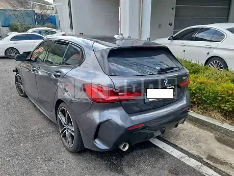 Photo 2 of 23: 2021 BMW 118d, VIN WBA7M9100M7H30929 — Korean insurance auction