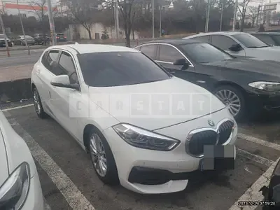 Photo 1 of 17: 2021 BMW 118d, VIN WBA7M9103M7H50396 — Korean insurance auction