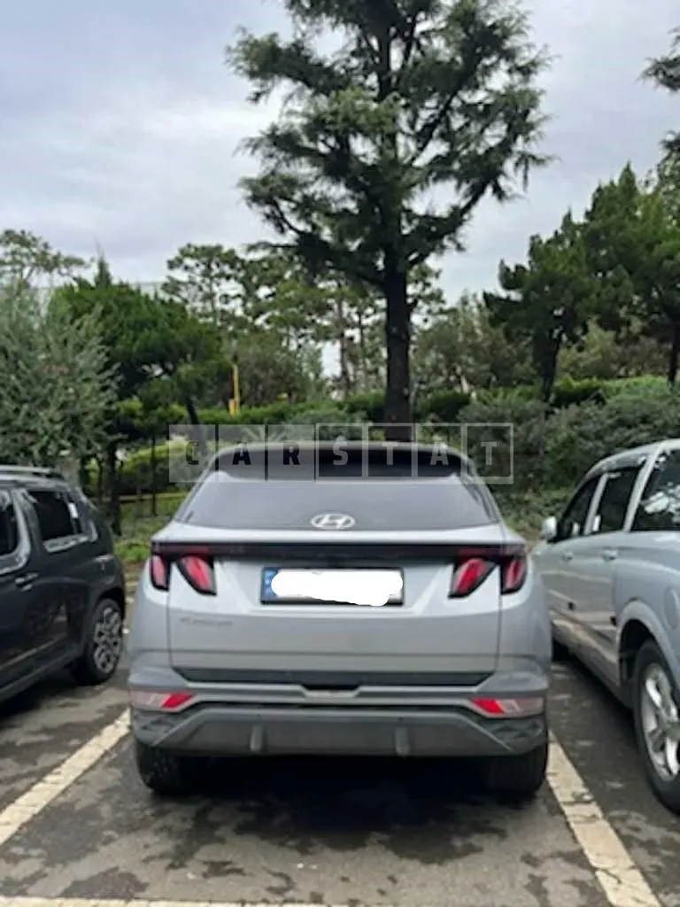 Photo 2 of 7: 2021 Hyundai Tucson, VIN KMHJC81CBMU053612 — Korean insurance auction