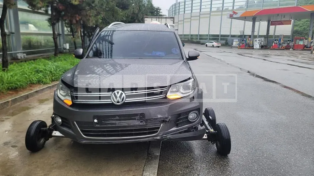 Photo 2 of 9: 2015 Volkswagen Tiguan, VIN WVGZZZ5NZFW566595 — Korean insurance auction