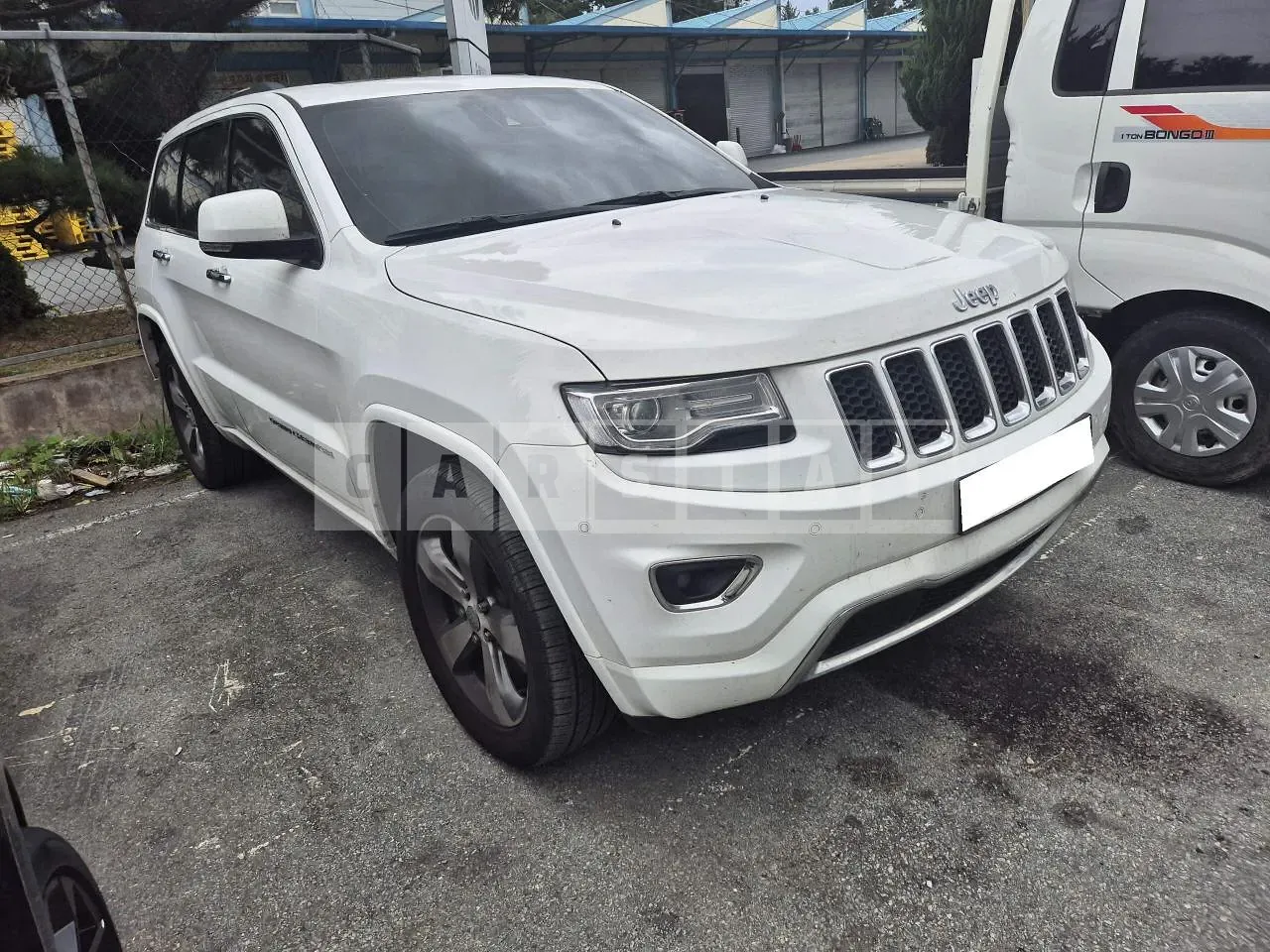 Photo 2 of 7: 2015 Jeep Grand Cherokee, VIN 1C4RJFCM2FC928115 — Korean insurance auction