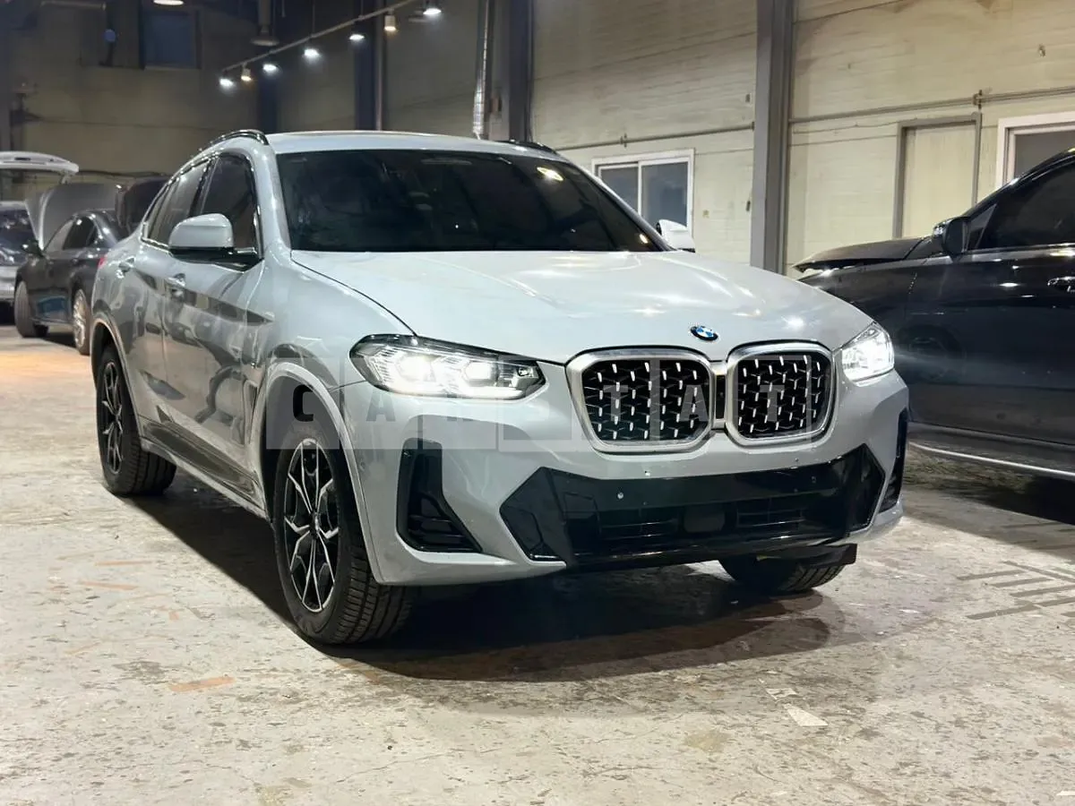 Photo 2 of 13: 2024 BMW X4 xDrive20i, VIN WBA21DT00R9X38931 — Korean insurance auction