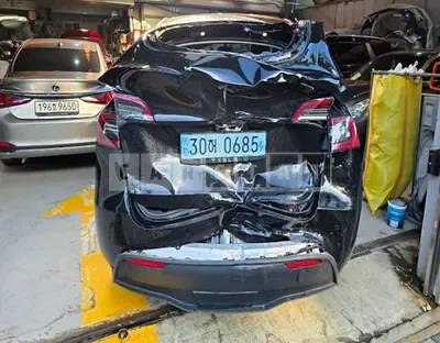 Photo 1 of 12: 2021 Tesla Model Y Standard Range, VIN 5YJYGDED1MF235208 — Korean insurance auction