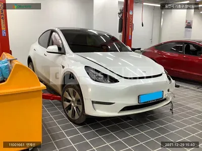 Photo 1 of 28: 2021 Tesla Model Y Standard Range, VIN 5YJYGDED2MF235654 — Korean insurance auction