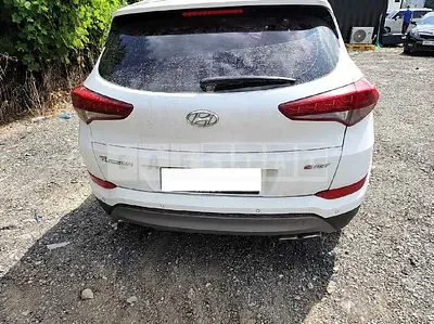 Photo 1 of 11: 2016 Hyundai Tucson, VIN KMHJ381ABGU014860 — Korean insurance auction