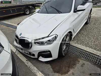 Photo 1 of 12: 2021 BMW X3 xDrive20d, VIN WBAUZ3102M9F68579 — Korean insurance auction