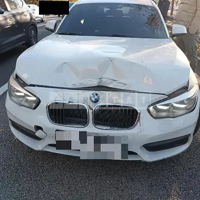 Photo 1 of 3: 2018 BMW 118d, VIN WBA1S5100J5L14372 — Korean insurance auction