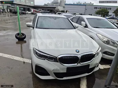 Photo 1 of 11: 2022 BMW 320i, VIN WBA5X5101NFM43319 — Korean insurance auction