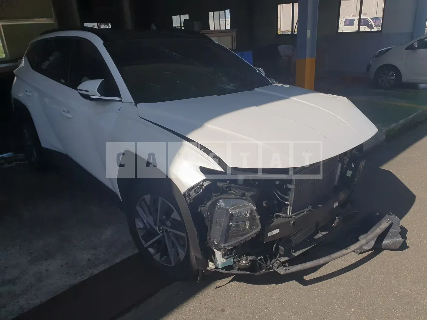 Photo 2 of 22: 2022 Hyundai Tucson, VIN KMHJE811BNU037638 — Korean insurance auction