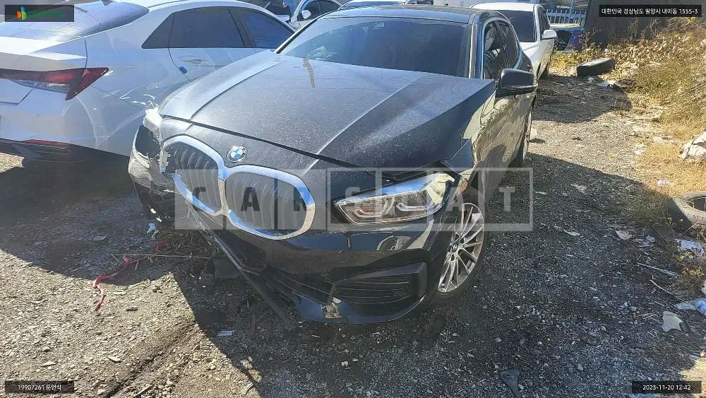 Photo 2 of 12: 2021 BMW 118d, VIN WBA7M9109M7H65730 — Korean insurance auction