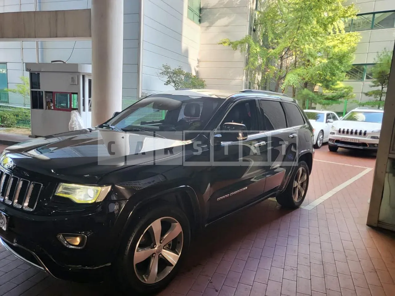 Photo 2 of 9: 2015 Jeep Grand Cherokee, VIN 1C4RJFCM1FC782855 — Korean insurance auction