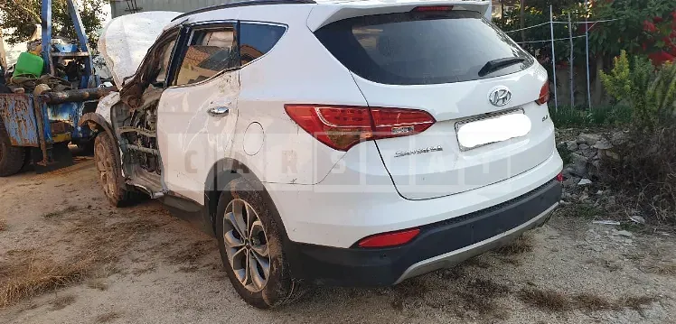 Photo 2 of 8: 2015 Hyundai Santa Fe, VIN KMHSW81UBFU355698 — Korean insurance auction