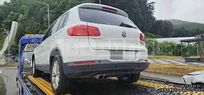 Photo 1 of 30: 2014 Volkswagen Tiguan 2.0 TDI Blue Motion, VIN WVGZZZ5NZFW511111 — Korean insurance auction