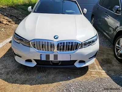 Photo 1 of 4: 2022 BMW 320i, VIN WBA5X5109NFM13744 — Korean insurance auction