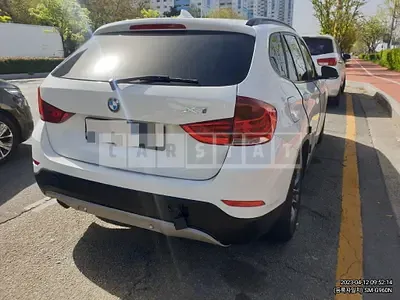 Photo 1 of 4: 2015 BMW X1 xDrive18d, VIN WBAVP7102FV207541 — Korean insurance auction