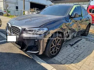 Photo 1 of 21: 2023 BMW X4 xDrive20i, VIN WBA21DT09P9N93546 — Korean insurance auction