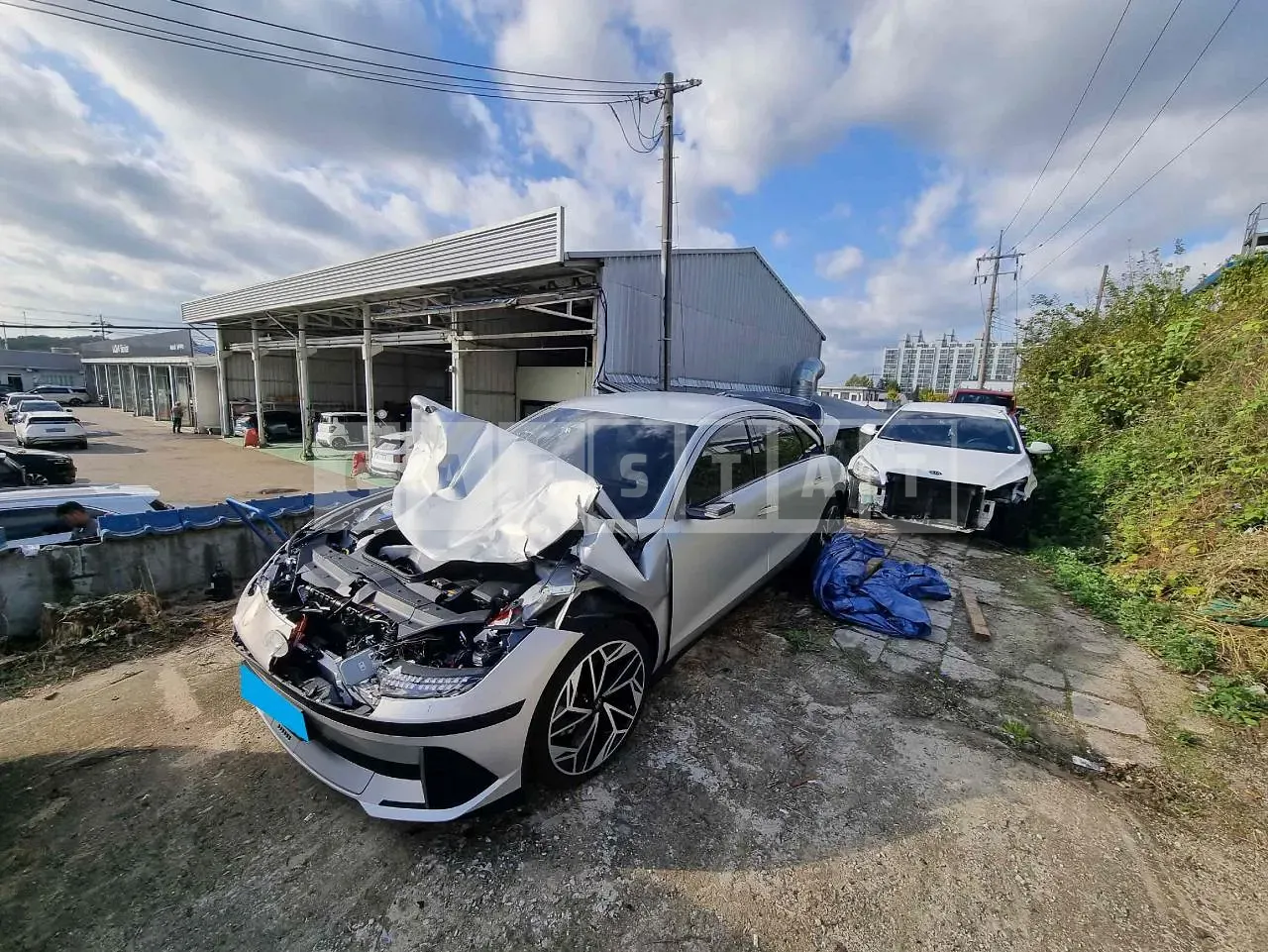 Photo 2 of 20: 2023 Hyundai IONIQ 6, VIN KMHM541AFPA038382 — Korean insurance auction