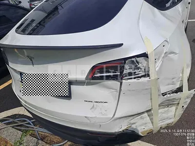 Photo 1 of 12: 2023 Tesla Y Long Range, VIN 7SAYGDEEXNF567063 — Korean insurance auction