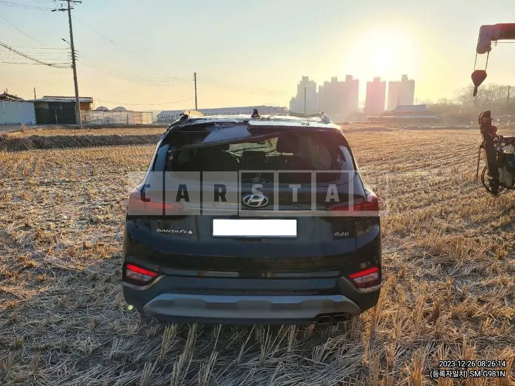 Photo 2 of 7: 2019 Hyundai Santa Fe, VIN KMHS381CBKU019453 — Korean insurance auction