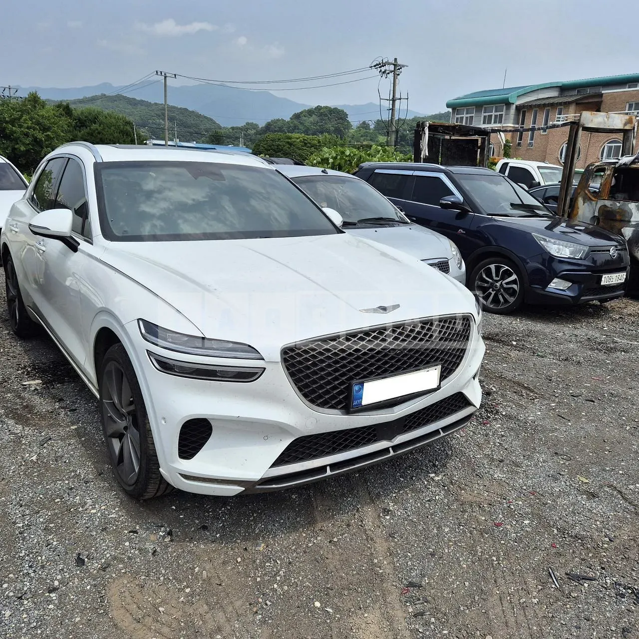 Photo 2 of 17: 2021 Genesis GV70, VIN KMTMC81CDMU001786 — Korean insurance auction