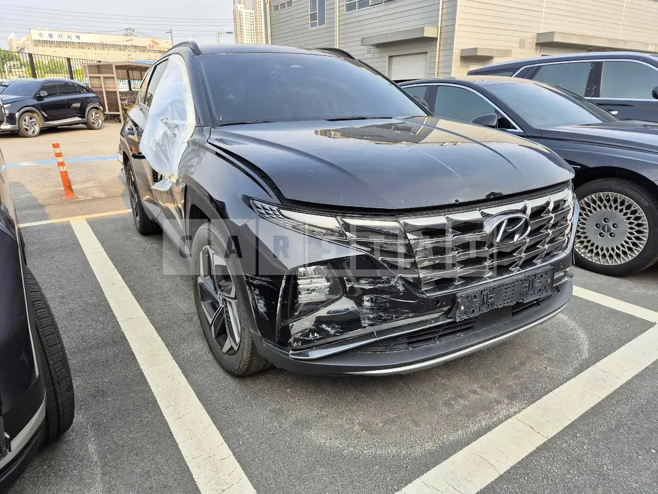 Photo 2 of 24: 2022 Hyundai Tucson, VIN KMHJE81BGNU127383 — Korean insurance auction
