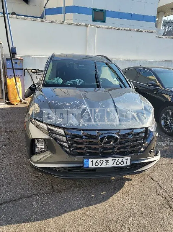 Photo 2 of 12: 2021 Hyundai Tucson, VIN KMHJC81BGMU072883 — Korean insurance auction