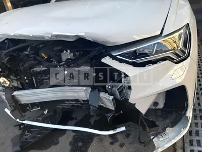 Photo 1 of 27: 2020 Audi Q3, VIN WAUZZZF30L1097781 — Korean insurance auction