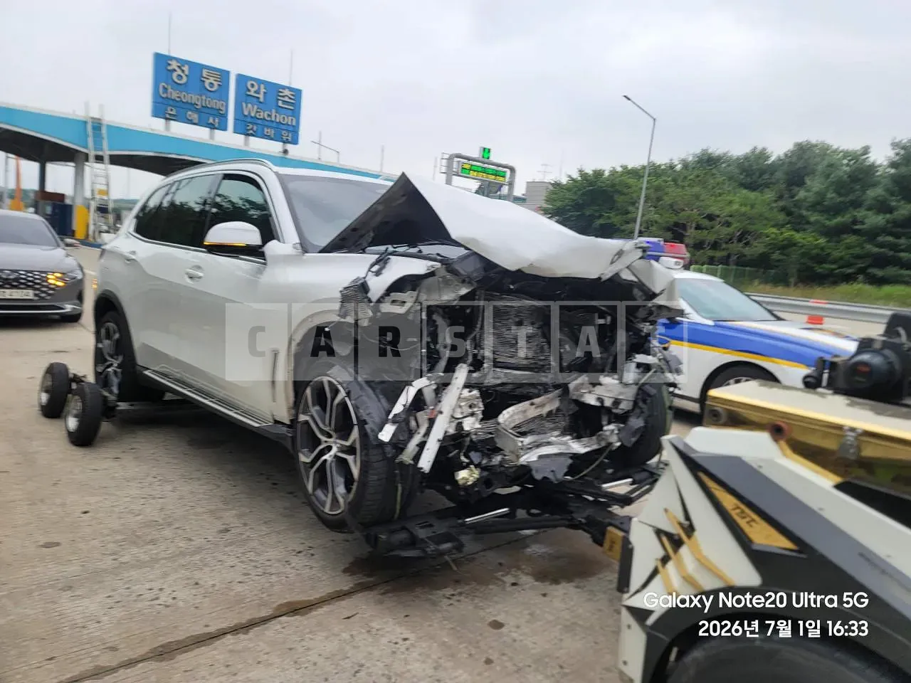 Photo 2 of 7: 2022 BMW X5 xDrive30d, VIN WBAJU810XN9M41446 — Korean insurance auction