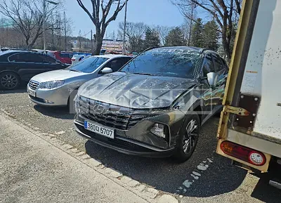 Photo 1 of 16: 2021 Hyundai Tucson, VIN KMHJC811BMU012660 — Korean insurance auction