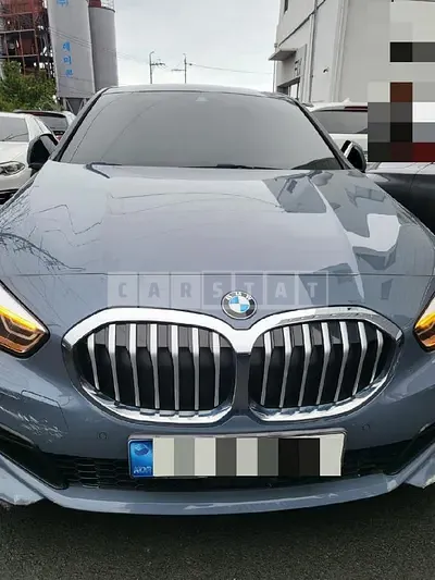 Photo 1 of 28: 2021 BMW 118d, VIN WBA7M9104M7H83522 — Korean insurance auction