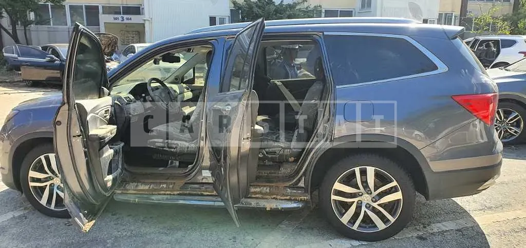 Photo 2 of 9: 2018 Honda Pilot, VIN 5FNYF6850JB200131 — Korean insurance auction