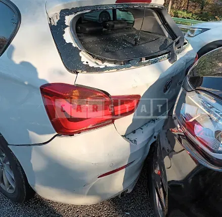 Photo 3 of 3: 2018 BMW 118d, VIN WBA1S5100J5L14372 — Korean insurance auction